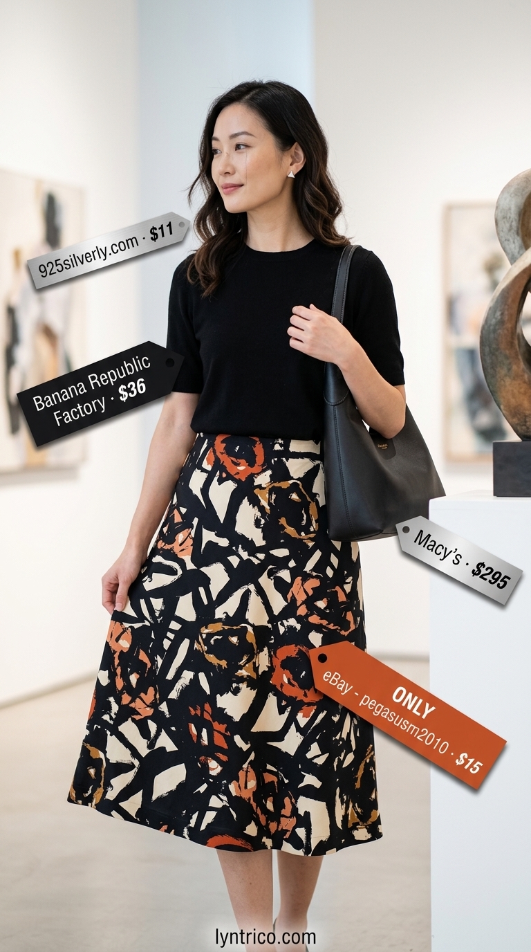 Flattering summer outfit for women over 40 2026: Abstract print midi skirt & black knit top.