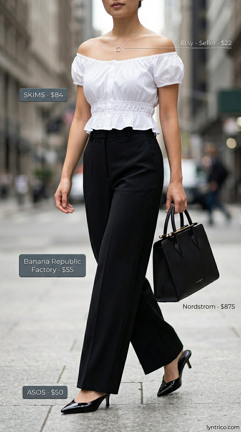 Sophisticated flowy summer off-shoulder outfits 2026: White poplin top, black wide-leg trousers, mules for city brunch.