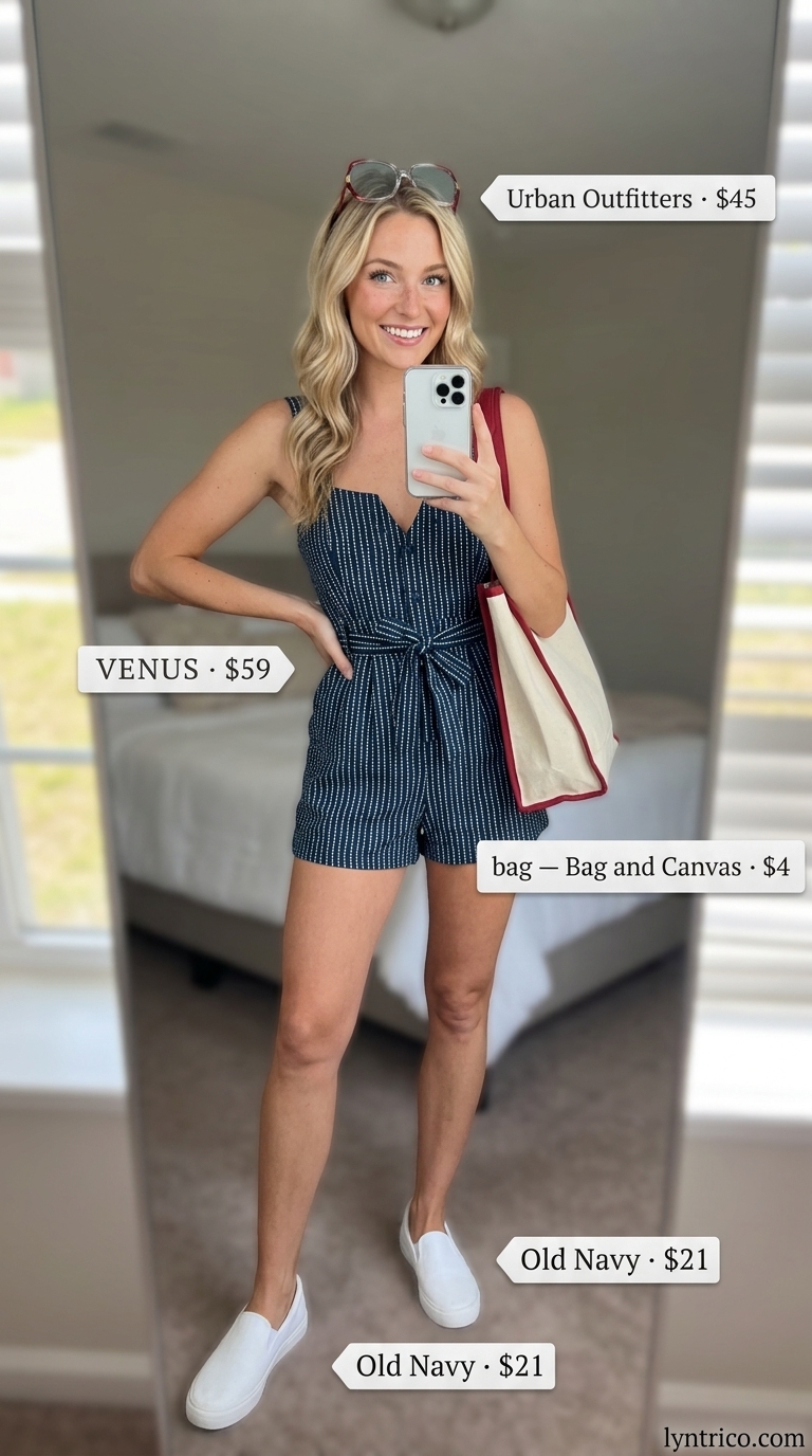 Navy and white striped linen romper outfit for women 2026, perfect for beach days with red sunglasses.