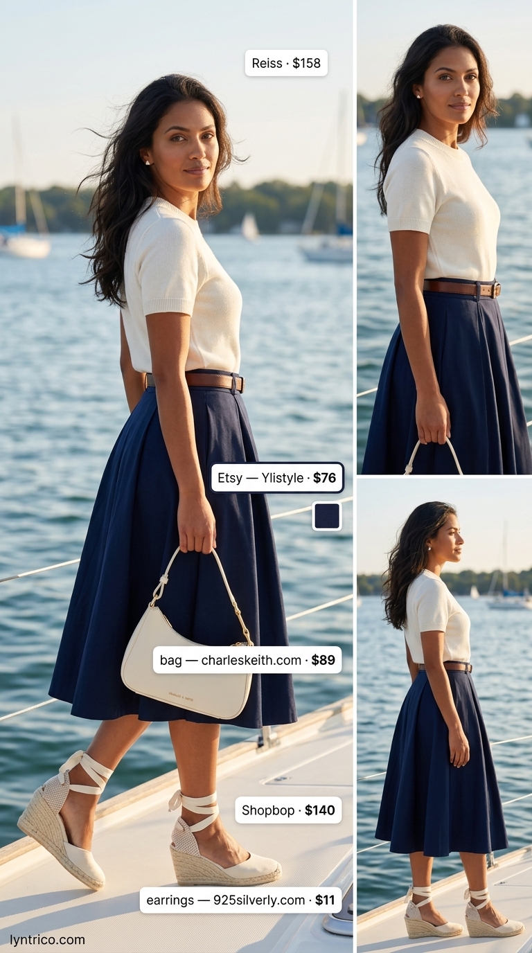 Neutral quiet luxury summer outfits for women 2026: Navy skirt, white knit top, straw clutch, gold jewelry.