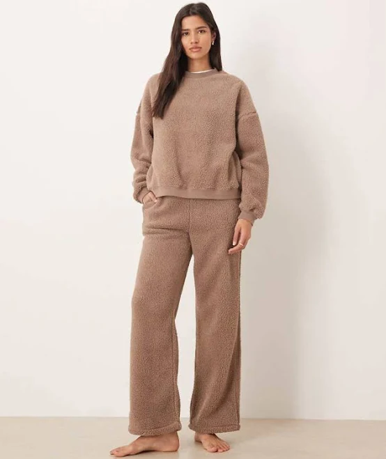 matching set ASOS DESIGN lounge cuddle crew neck sweatshirt & wide leg pants set in light brown ASOS $32.99