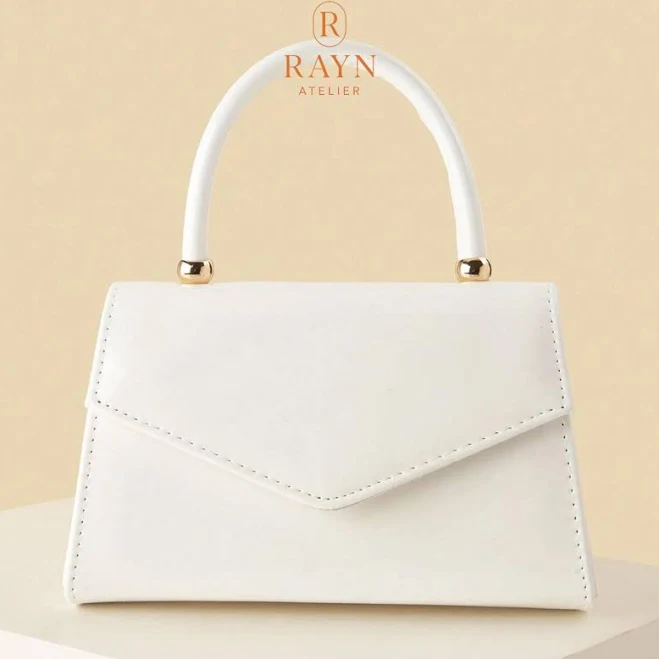 Small structured backpack with gold hardware