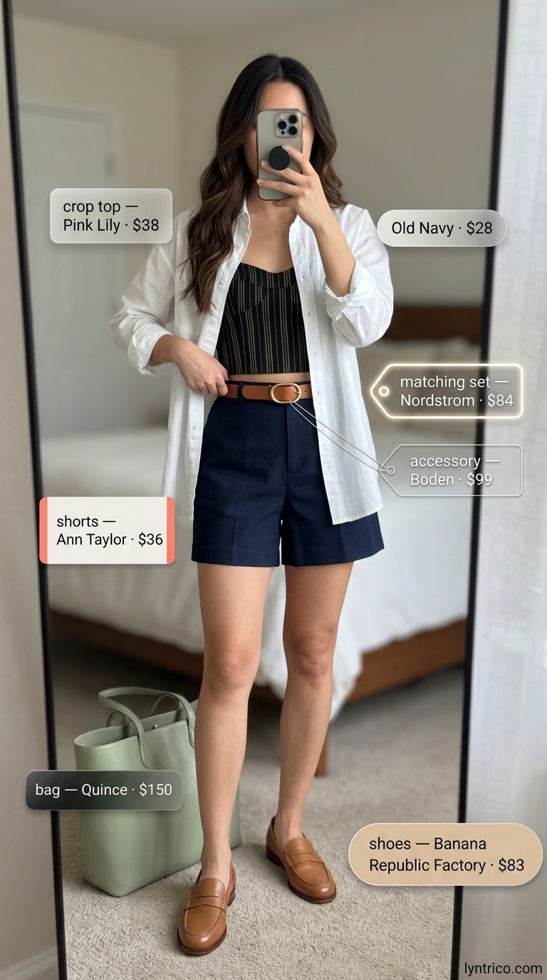 Navy blue chino shorts and white button-down shirt for preppy summer casual outfits 2026.