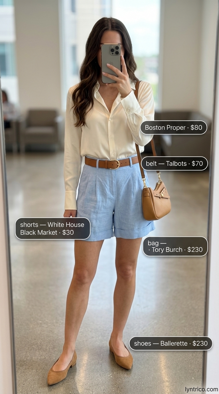 Summer linen business casual outfit for women 2026: Light blue shorts, cream blouse, tan ballet flats.