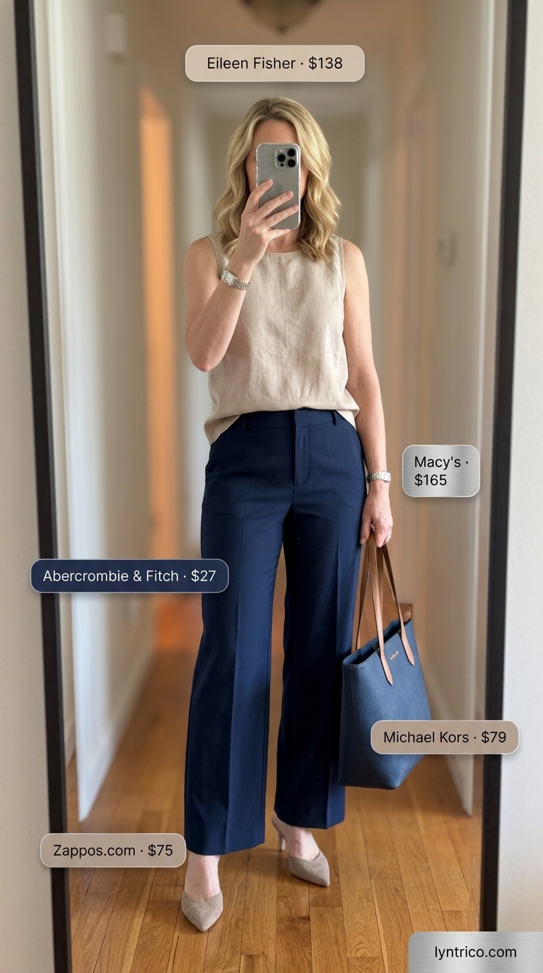 Navy linen shell top with beige wide-leg trousers for modern executive wear 2026.