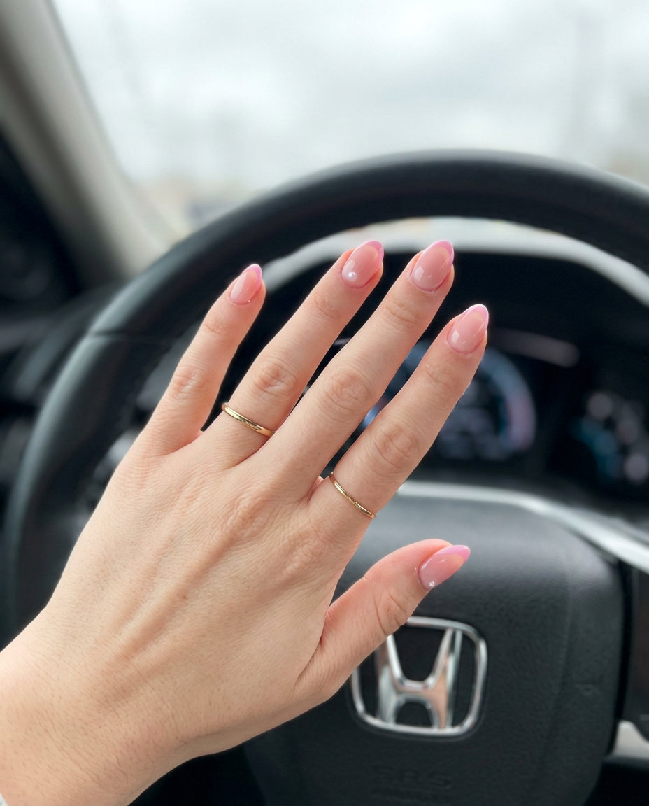 Sheer Pink Pearl Almond Nails 2026 | Clean Girl Style Almond summer nails 2026 for fair skin: Sheer pink reverse French with pearl accent for everyday and office wear.