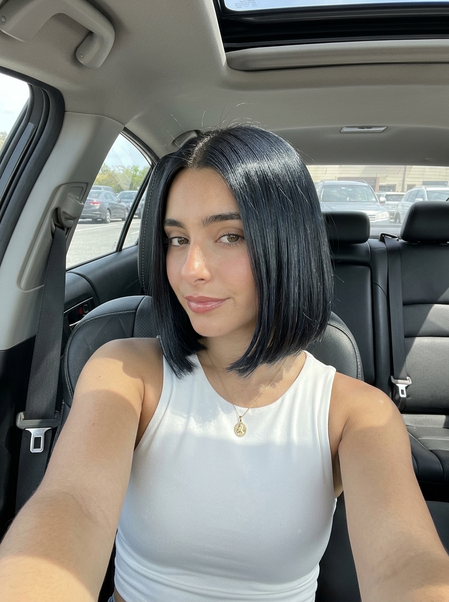 short french bob haircut in deep espresso brunette with a high-gloss finish for elegant looks