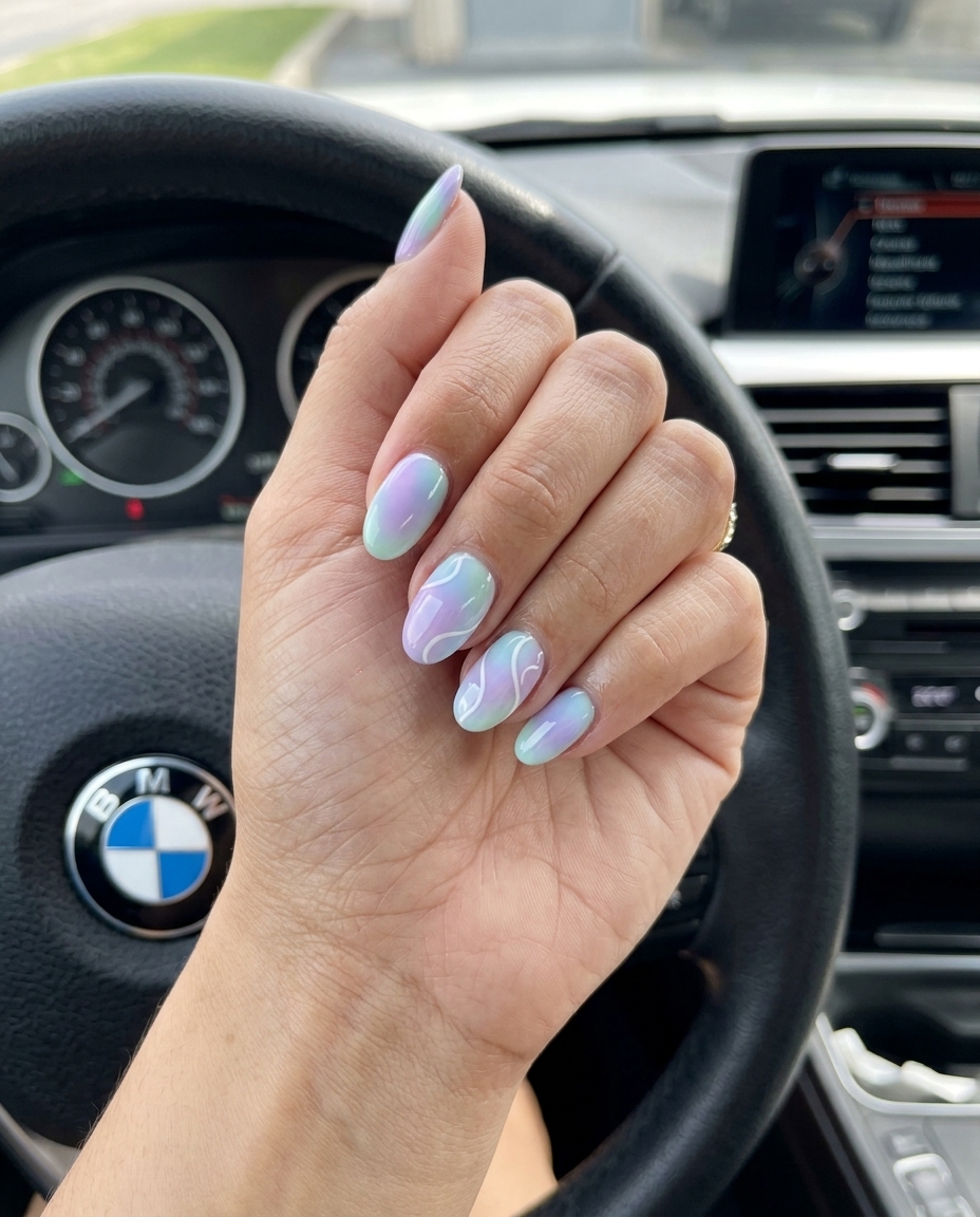 Dreamy pastel aura swirl nails for june nails ideas 2026. Whimsical and ethereal for casual weekends.