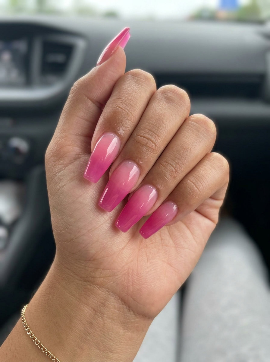 Pink Summer Nails 2026: Gradient Jelly Coffin Pink gradient jelly coffin nails for summer 2026, ideal for parties and night outs. Glamorous and bold.