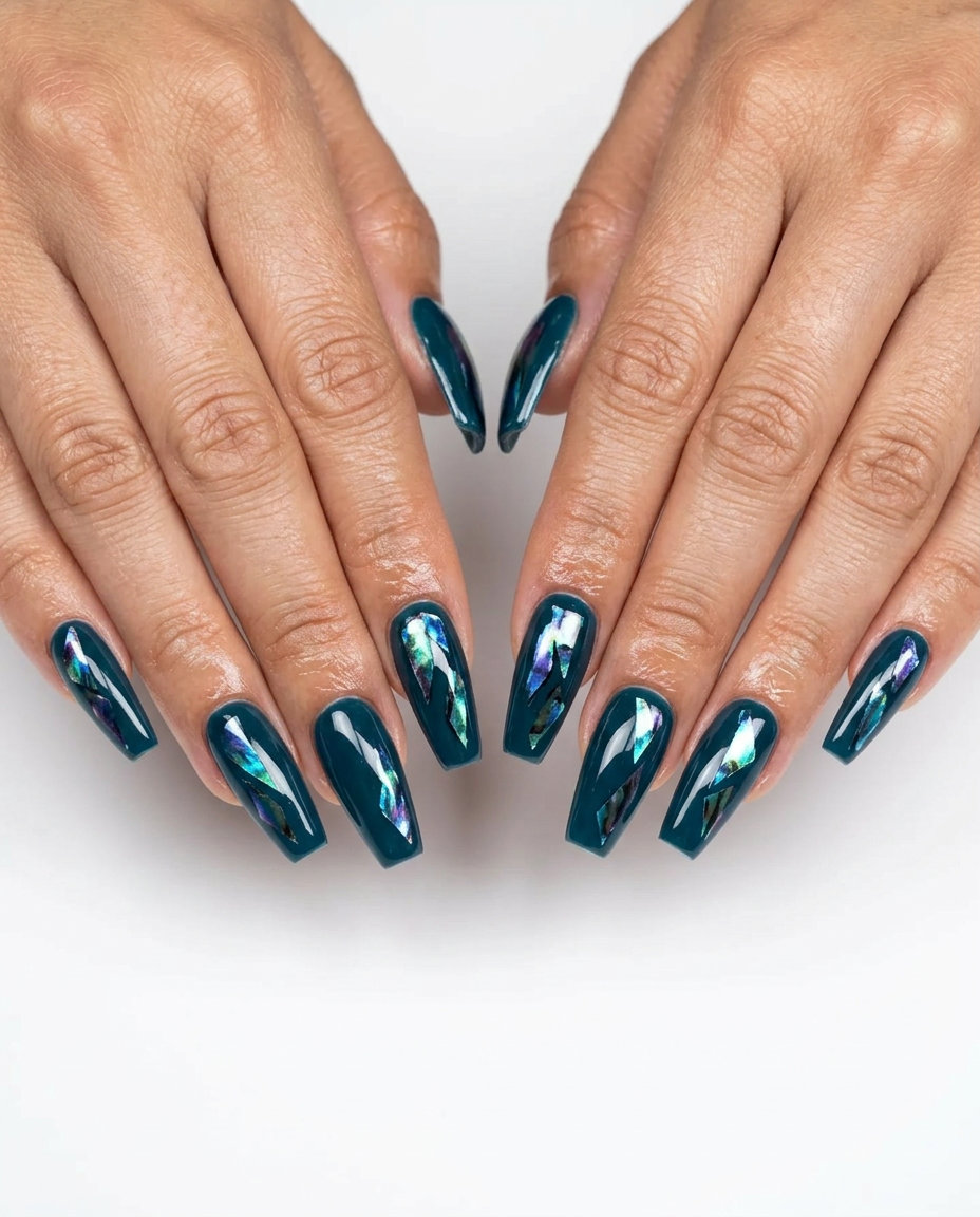 Shell Summer Nails 2026: Chrome Shell Fragments Chrome shell fragment accent nails for shell summer nails 2026. Edgy evening event or party style.