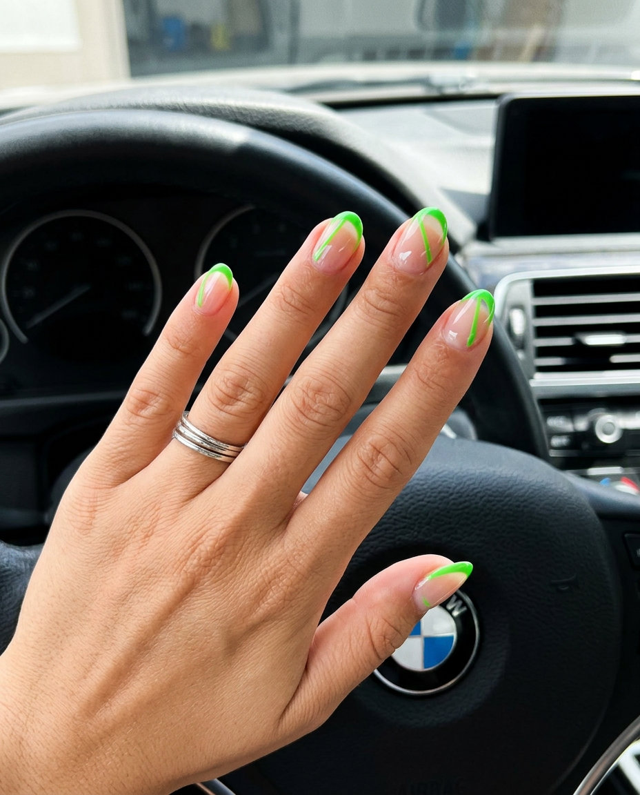 Short oval summer nails 2026 with lime green negative space lines. Edgy, modern party festival style.