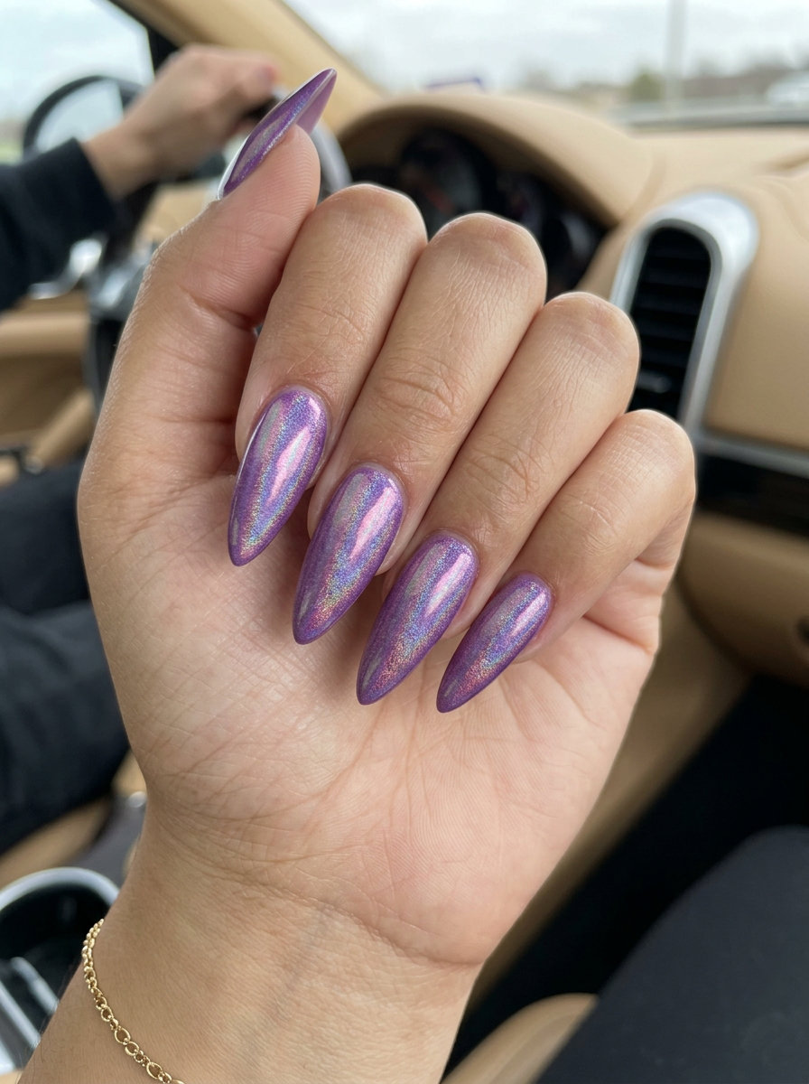 Amethyst Stiletto Summer Nails 2026 Amethyst stiletto summer nails 2026 with holographic shifts for nightlife and parties.
