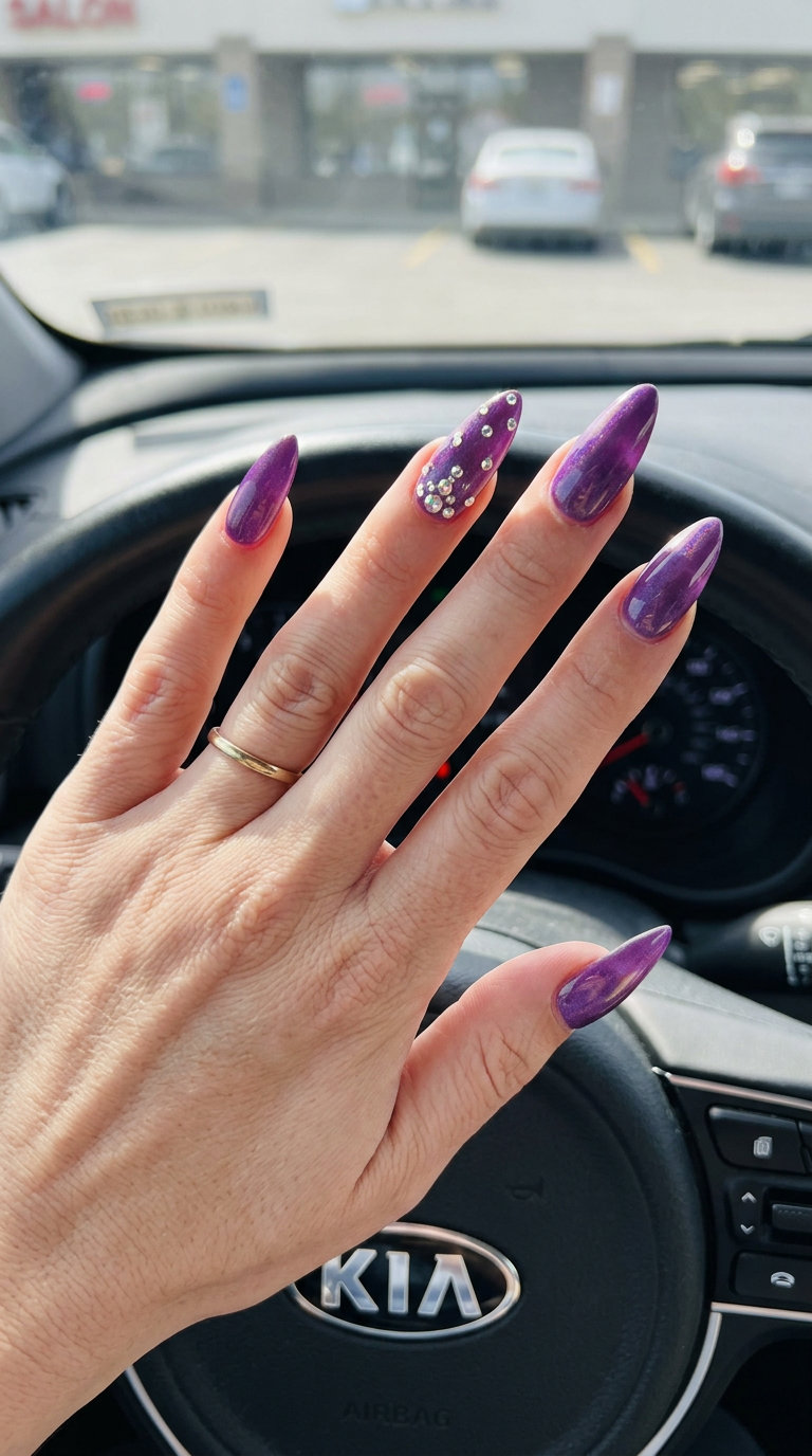 Amethyst Sparkle Stiletto Nails 2026: Glamorous Amethyst purple stiletto nails with rhinestone sparkle 2026 for weddings and special events.