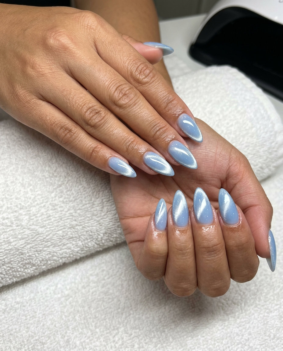 Sheer Blue Cat-Eye Stiletto Nails 2026: Dreamy Sheer blue stiletto cat-eye nails 2026 for date nights and bridal showers. Romantic and dreamy.