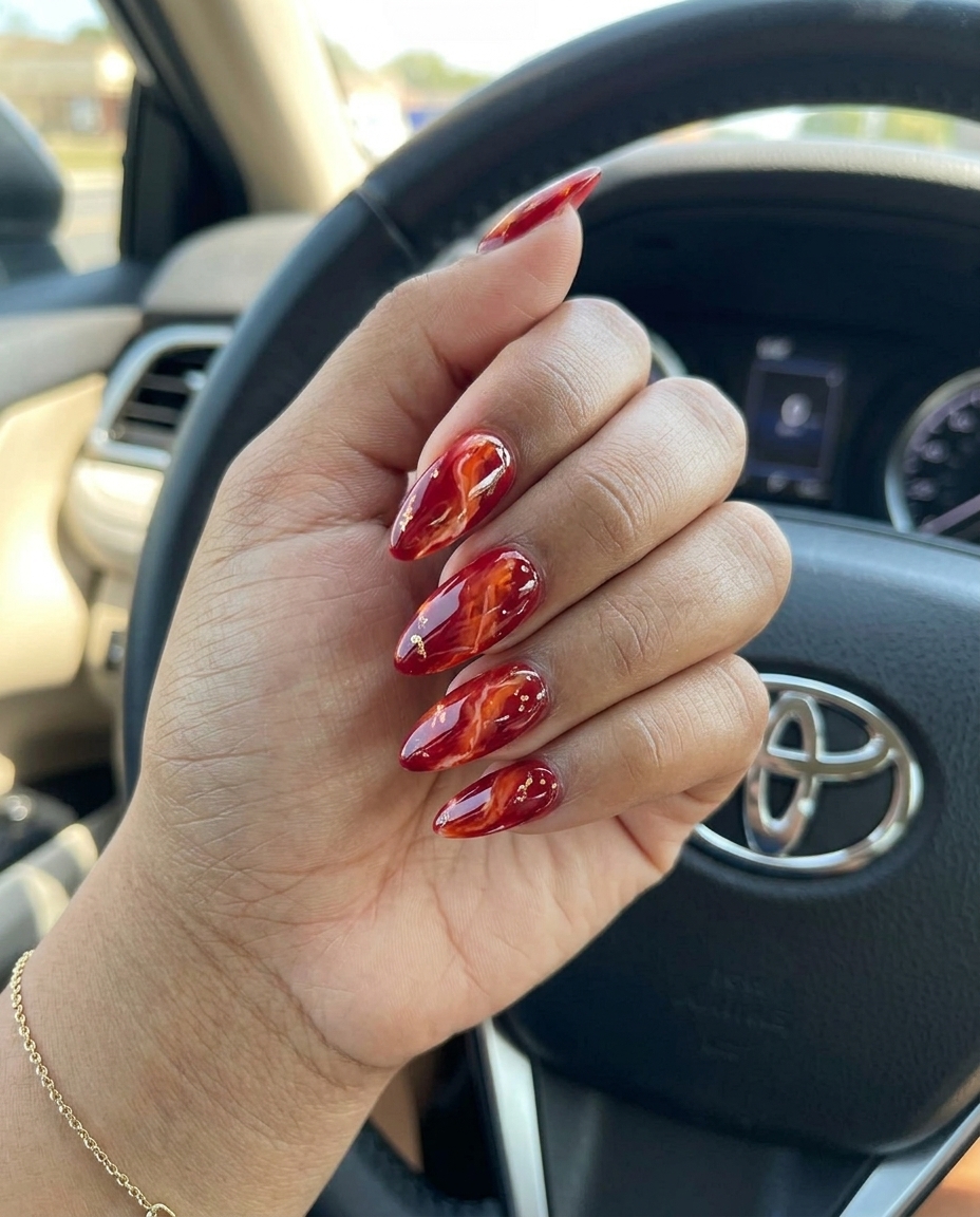 Blood Orange Marble 2026 | Elegant Evening Nails Blood Orange Marble Swirls: Sultry red, orange, white marble with gold veins for summer citrus nail art 2026.