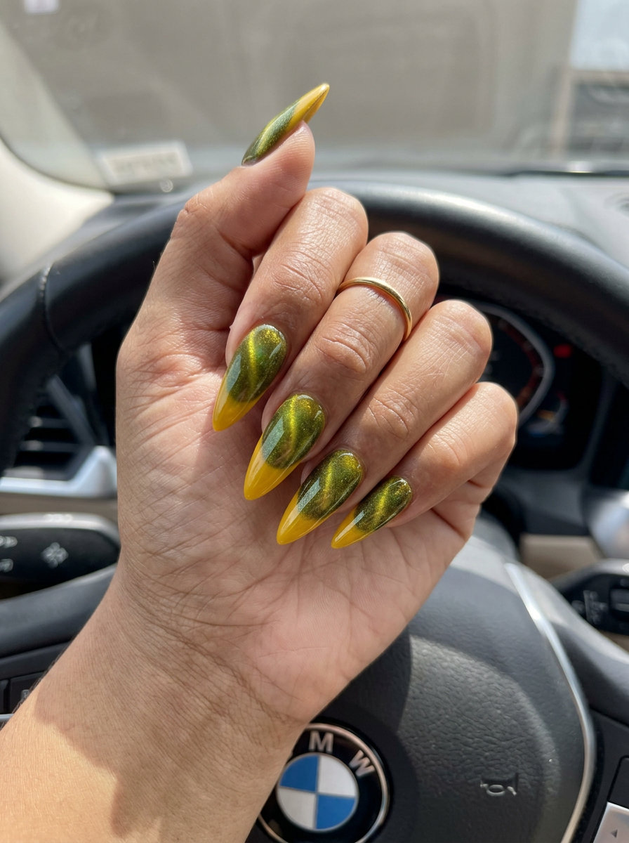 Yuzu Cat-Eye Nails | Summer Citrus Nail Art 2026 Futuristic vibrant yellow nails with a green-gold cat-eye shift for summer citrus nail art 2026. Bold and energetic.