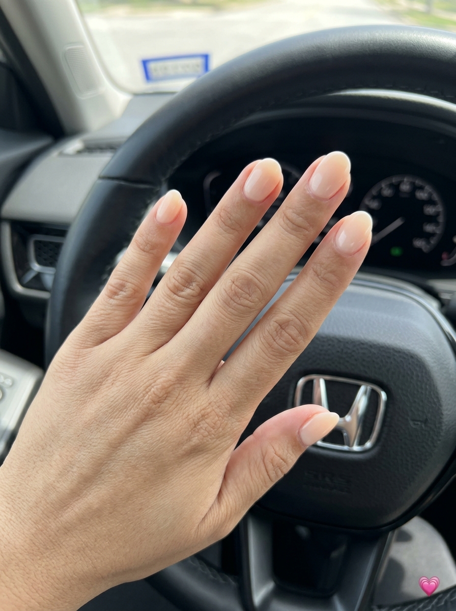 Summer Classy Nails 2026: Peach Milky Oval Soft pale peach oval nails with a milky finish, perfect for casual summer classy nails 2026.