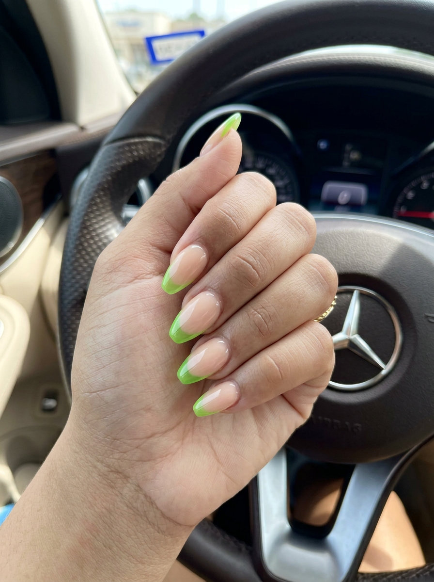 Lime green jelly micro French tips on sheer nude base for summer colorful nails designs 2026. Fresh and playful.
