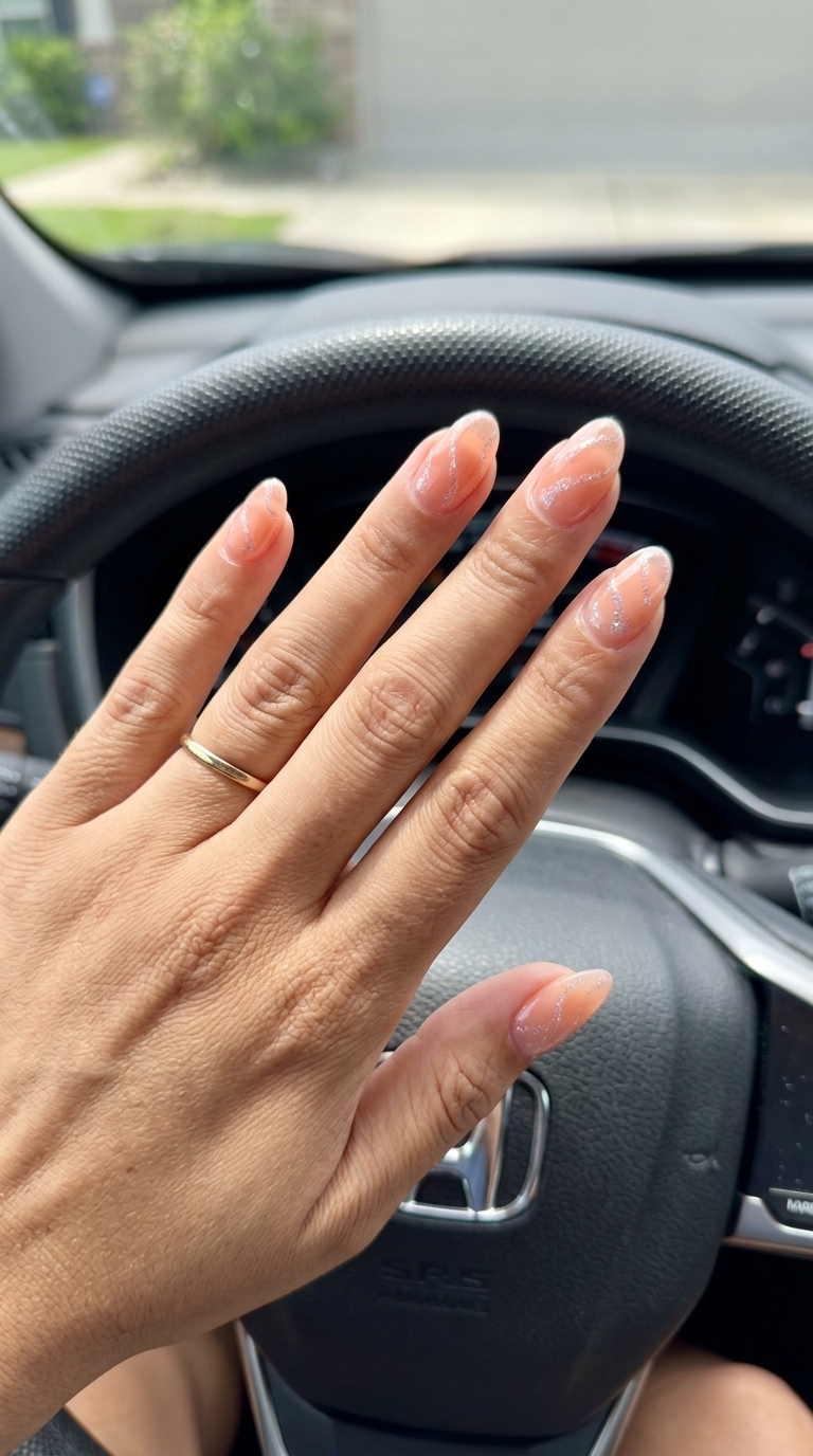 Peachy dream swirls with iridescent glitter for summer glitter nails 2026. Romantic and dreamy.