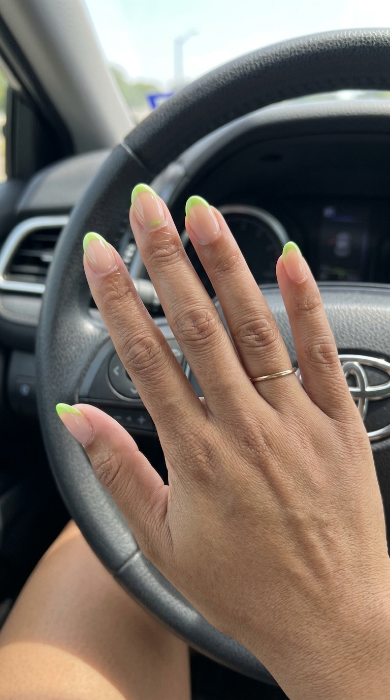 Lime Zest Micro French nails: vibrant lime green tips on sheer milky white for fresh summer holiday nails 2026.