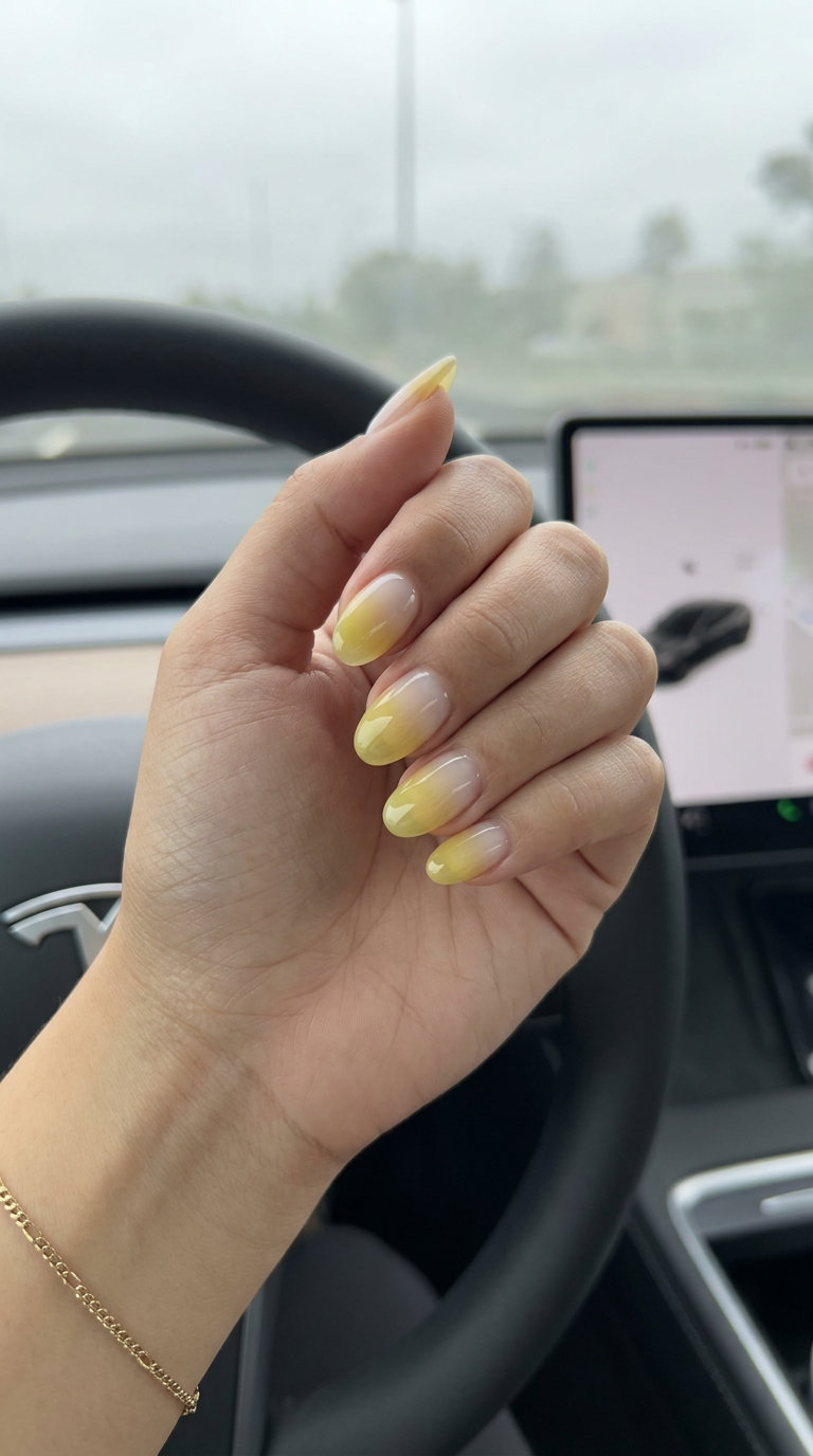 Sunrise Lemonade Aura Gradient Nails 2026 Sunrise Lemonade Aura Gradient nails: Sheer yellow to white gradient for romantic dates. 2026.