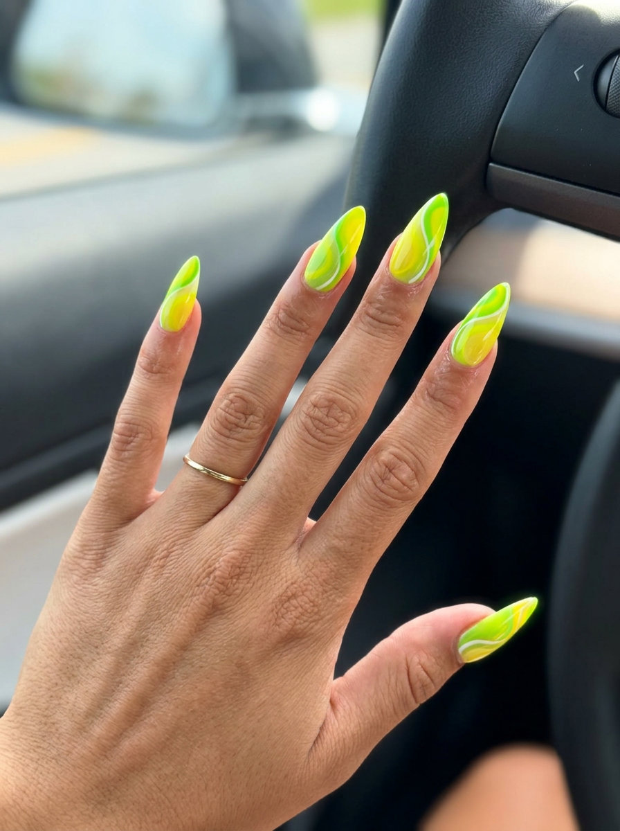 Summer Lemon Nails Ideas 2026: Zesty Citrus Swirl Zesty citrus swirl stiletto nails for festivals and night outs in 2026.