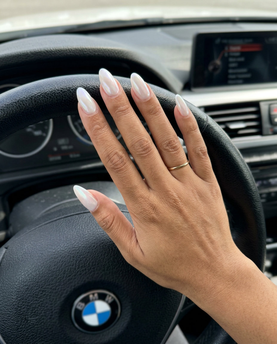Glamorous chrome accent half moon nails on sheer nude for date night or cocktail hour. Sophisticated summer nail manicure ideas 2026.