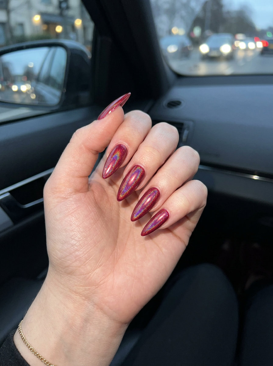 Summer Red Nails 2026: Crimson Holographic Glam Deep crimson holographic nails for summer red nails 2026 evening out, date night, or party. Mysterious, futuristic glam.