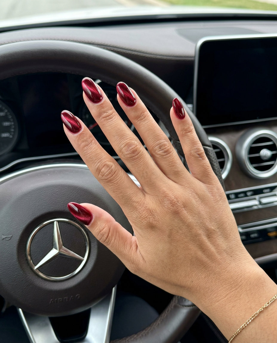 Deep Crimson Cat-Eye Nails 2026 | Sultry Summer Nights Deep Crimson Cat-Eye nails for summer red nails 2026: Crimson with magnetic shifting effect.