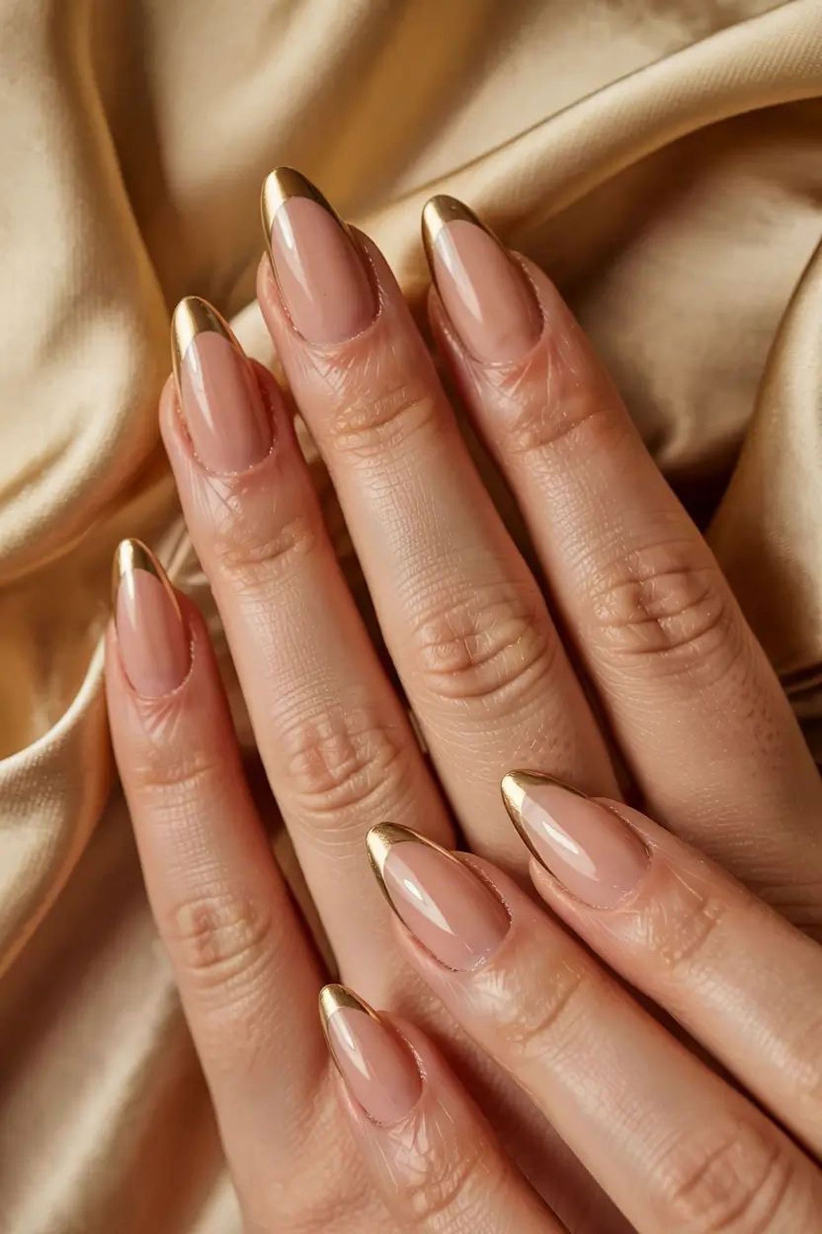 Gold Almond Nails Are the Most Elegant Holiday Manicure | Glamour