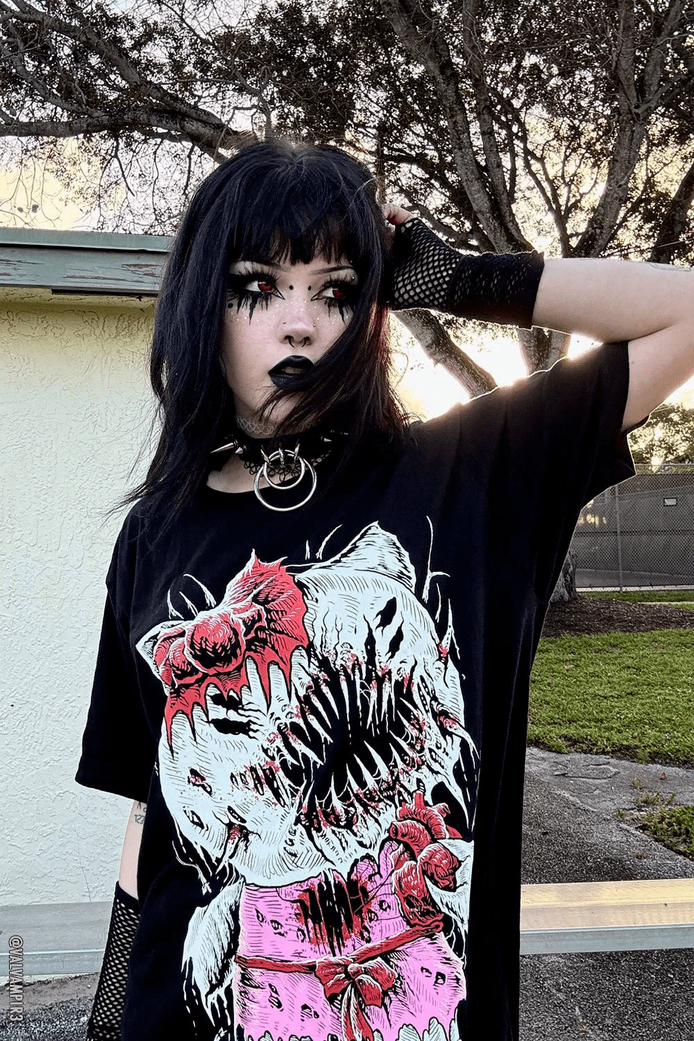 Graphic Impact: Oversized Tee, Spiked Choker, and Fishnet — Emo Outfits