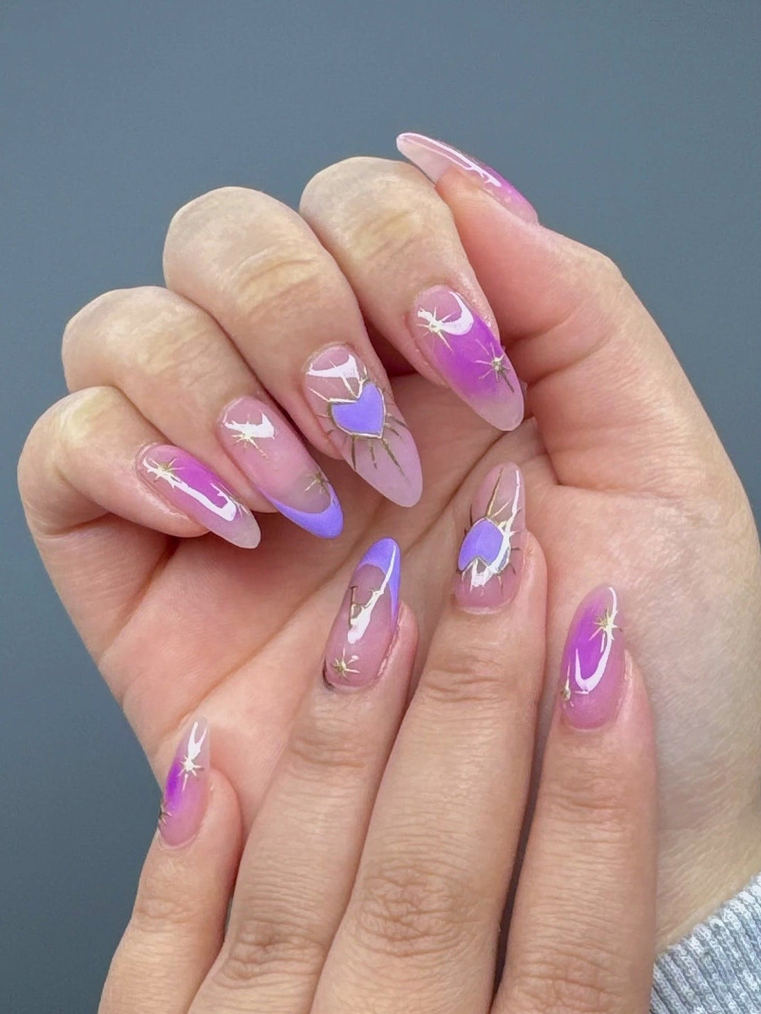 Clear to Pink Gradient with Purple Hearts and Stars Long Stiletto Nails Clear to Pink Gradient with Purple Hearts and Stars Long Stiletto Nails — Purple Nails