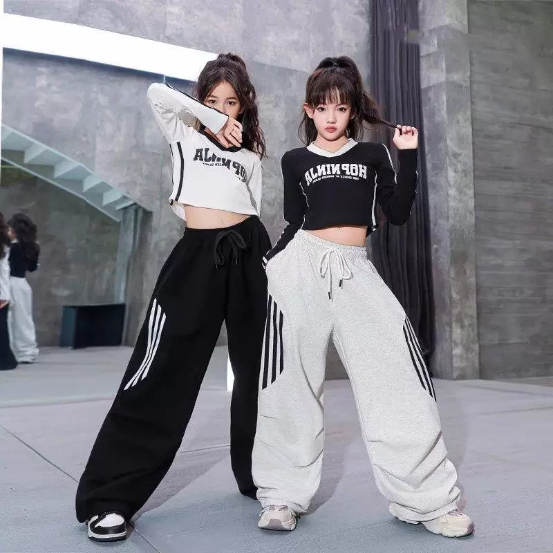 Matching Street Dance Outfits with Graphic Tops and Baggy Pants Matching Street Dance Outfits with Graphic Tops and Baggy Pants