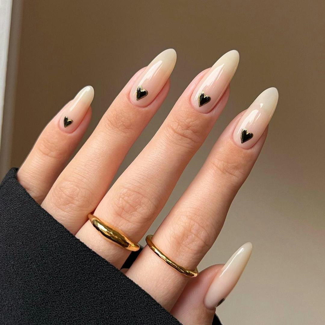 Medium Almond Nude With Black Heart Decals Medium Almond Nude With Black Heart Decals — Heart Nails