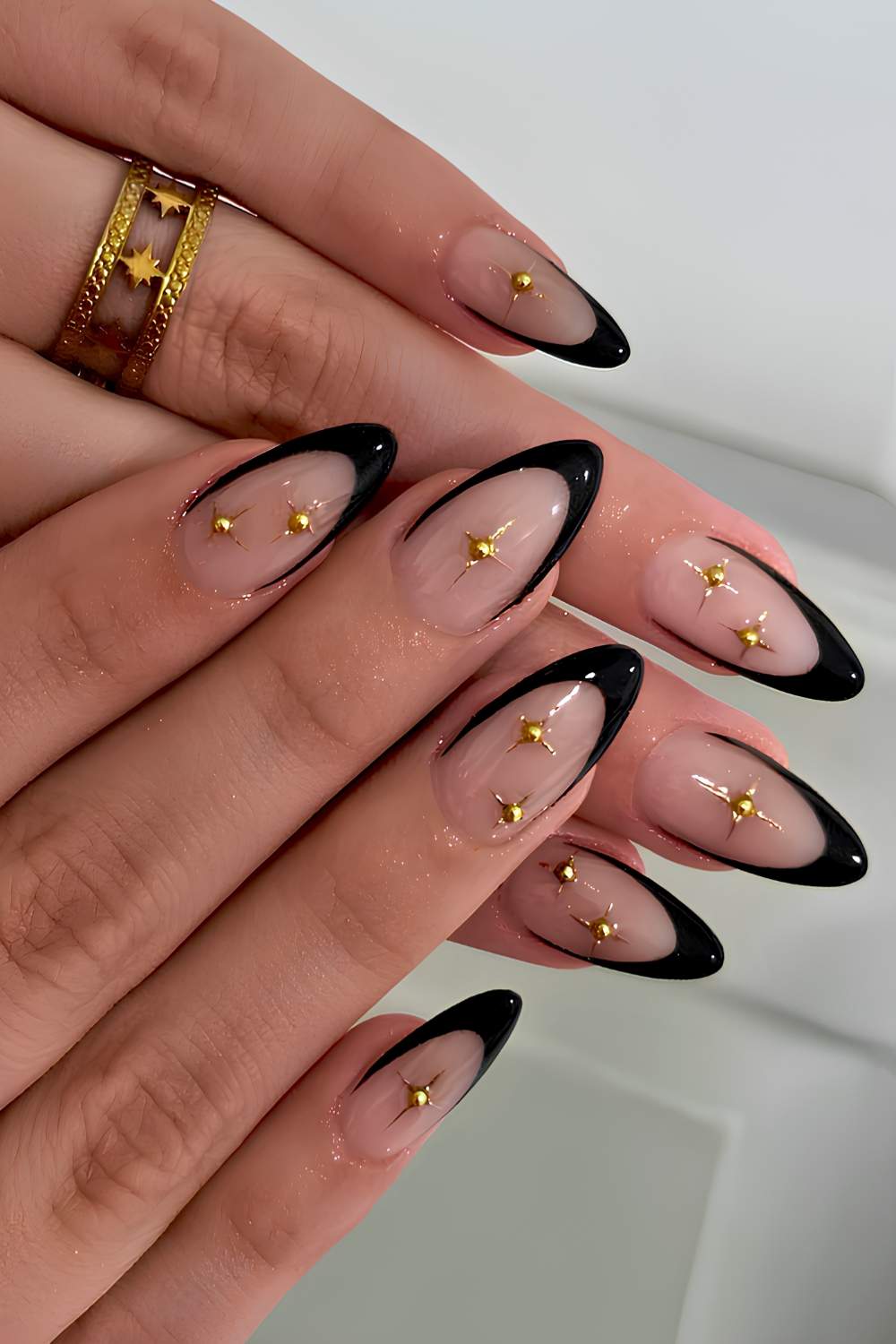 Long Almond with Black French Tips and Gold Studs — Black and Gold Nails