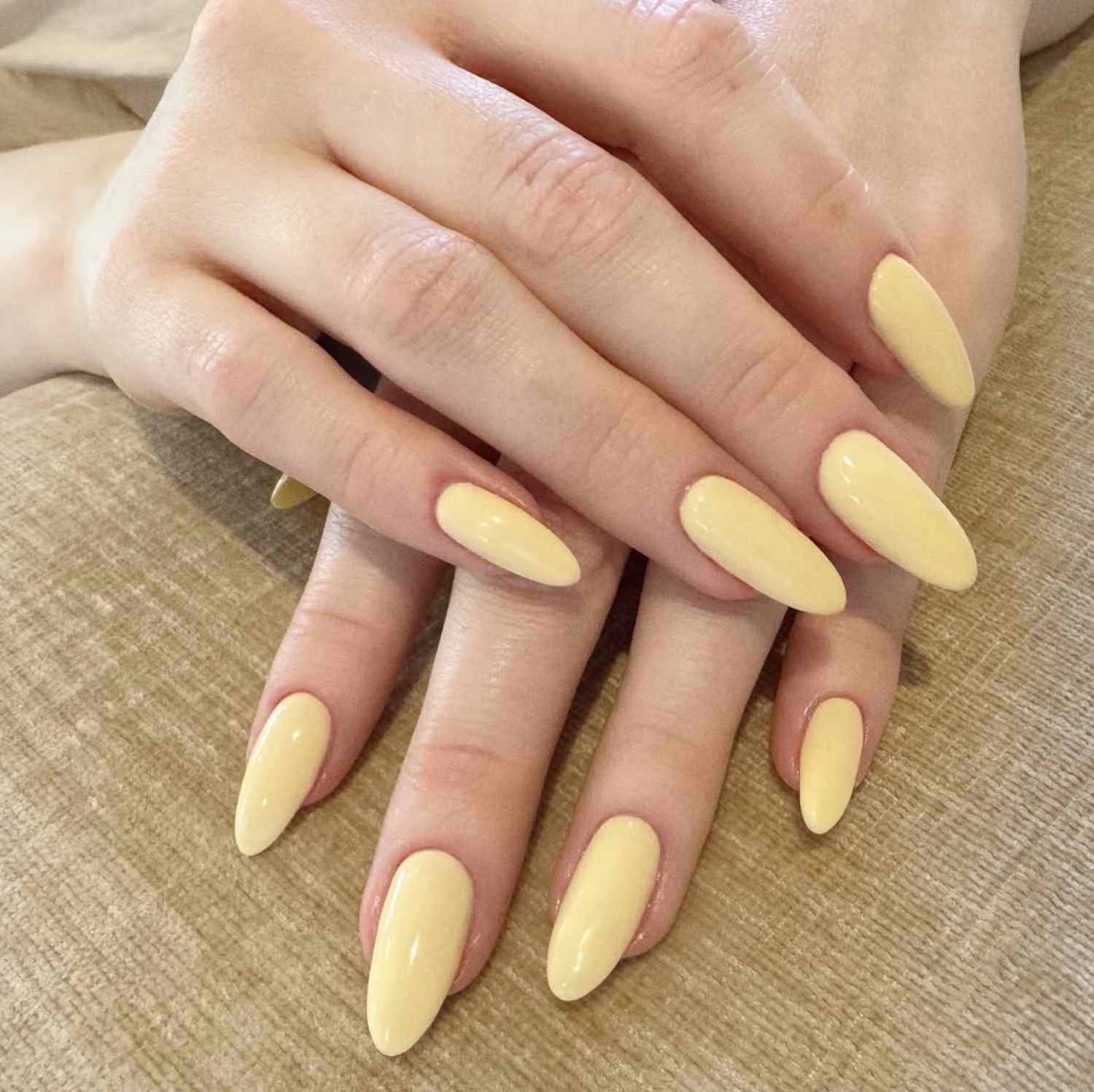 Both Hands Pale Yellow Opaque Almonds Both Hands Pale Yellow Opaque Almonds — Long Almond Nails