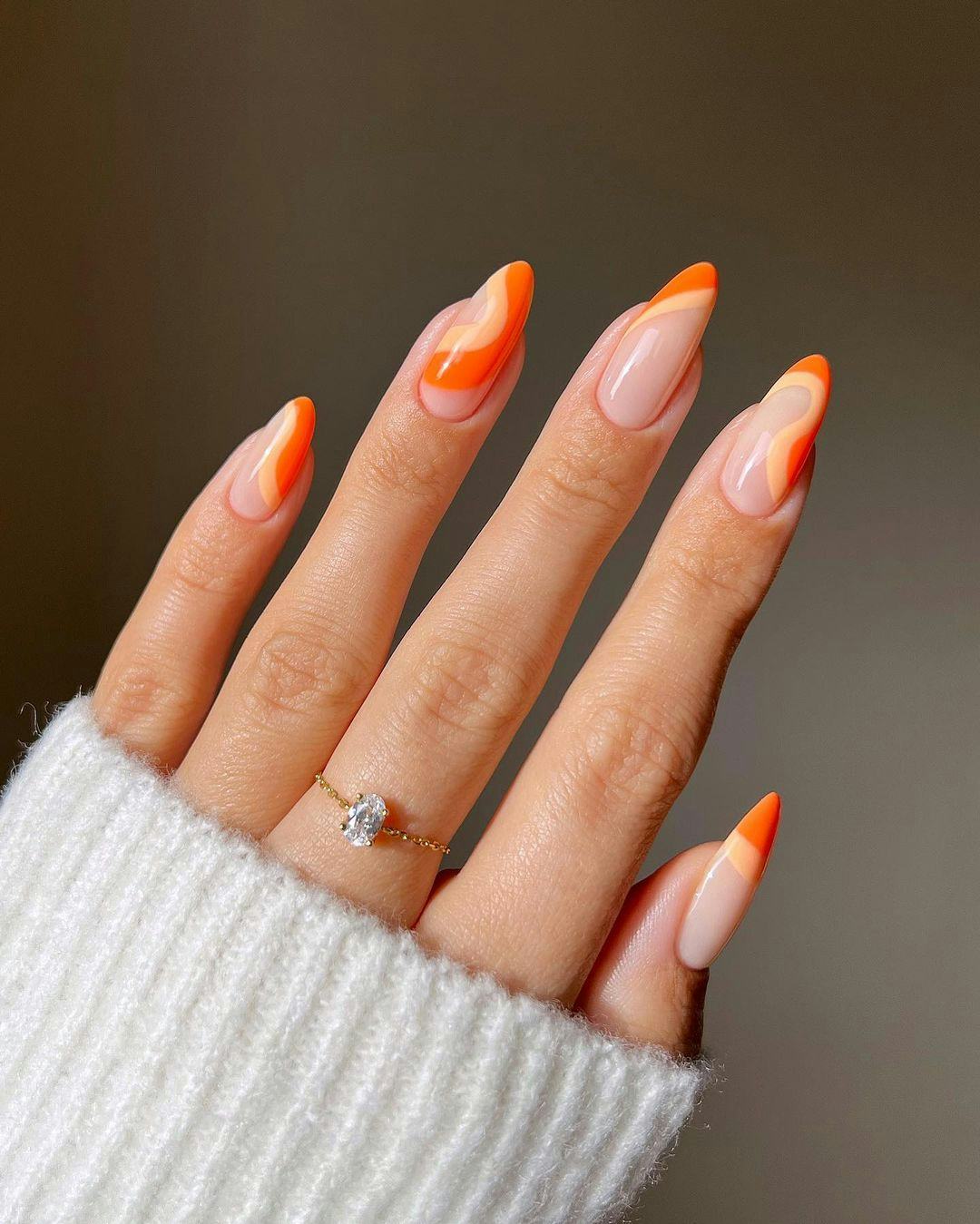 Sheer Nude with Orange Wavy Tips — Peach Nails