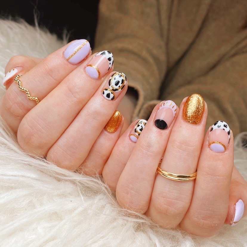 Glossy Metallic Gold Glitter White Black Lilac Cow Print with Gold Accents Glossy Metallic Gold Glitter White Black Lilac Cow Print with Gold Accents — Cow Print Nails