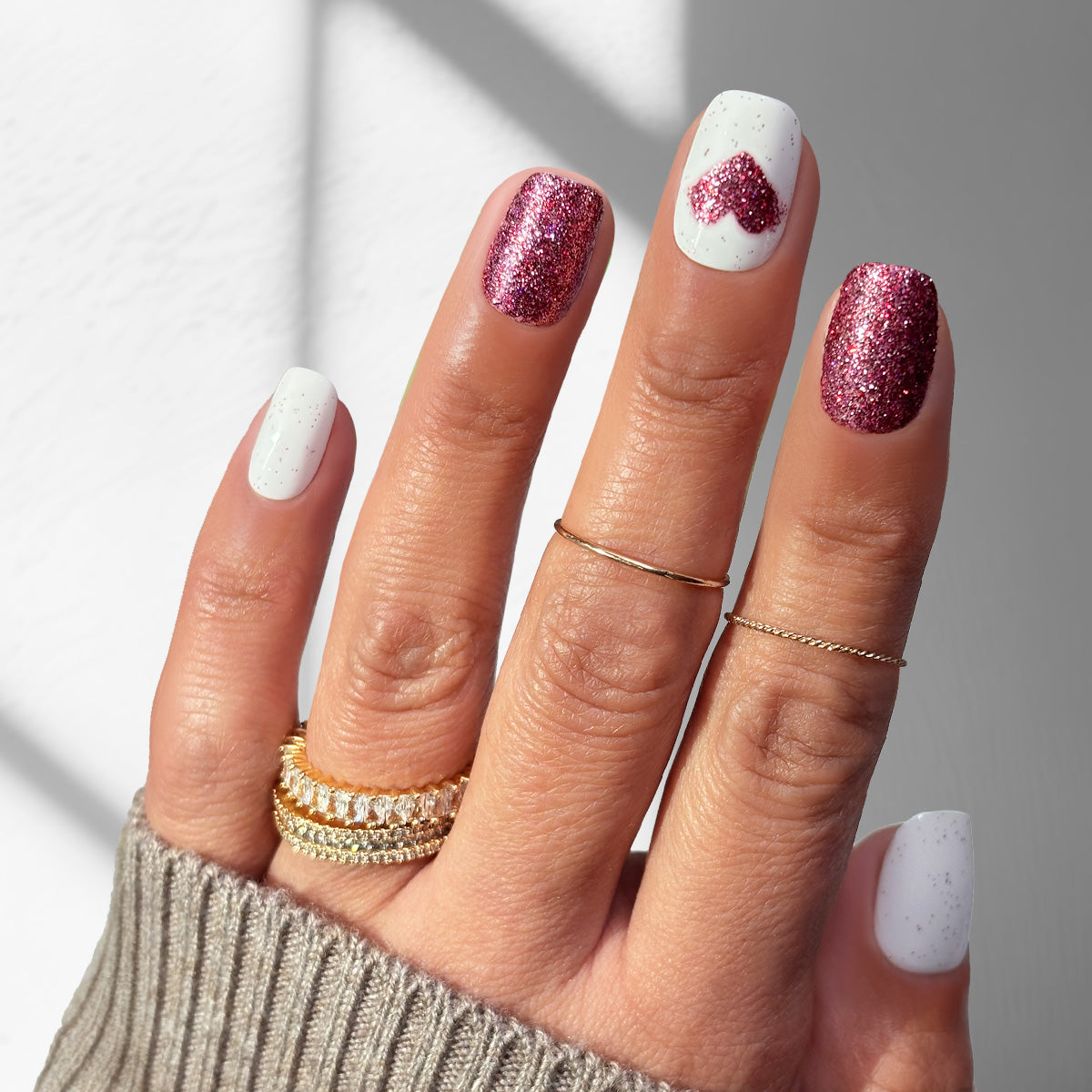 White with Pink Glitter Heart Accent — Medium Nails