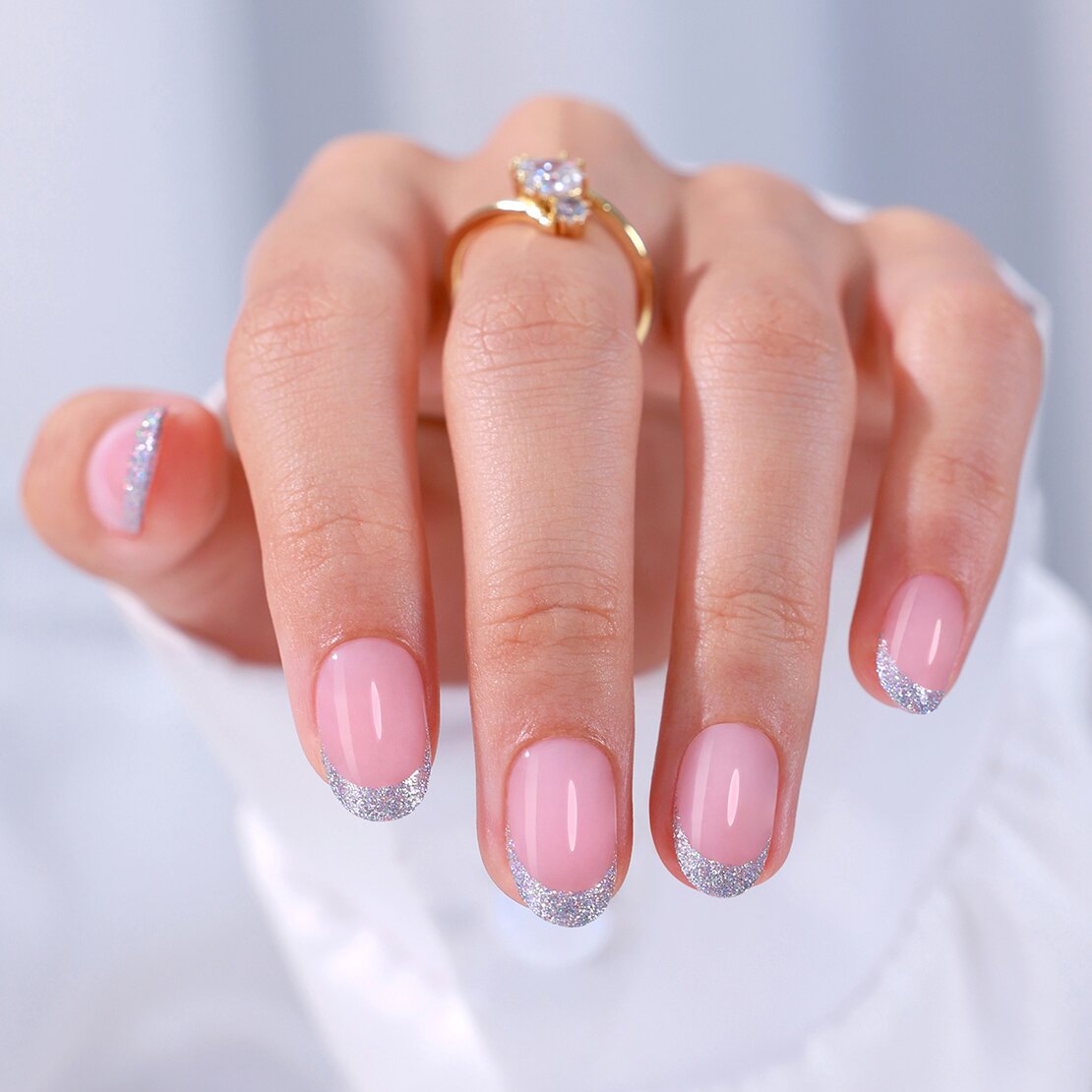 Glitter French Tip Statement — Short Oval Nails