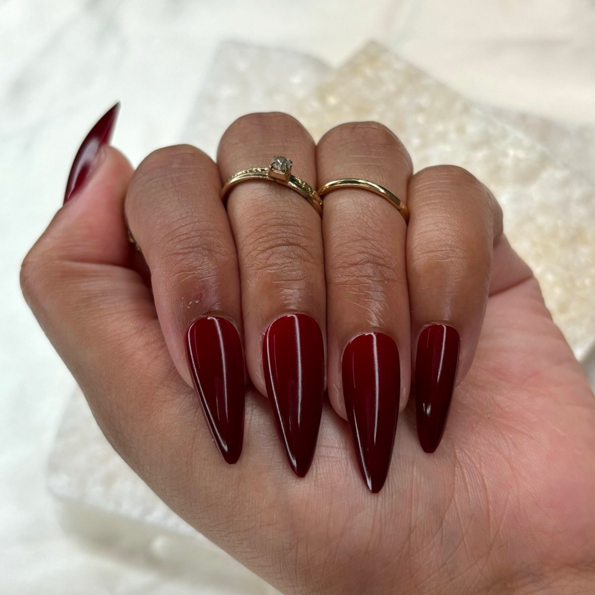 Glossy Dark Red Stiletto Nails with Gold Rings — Dark Red Nails