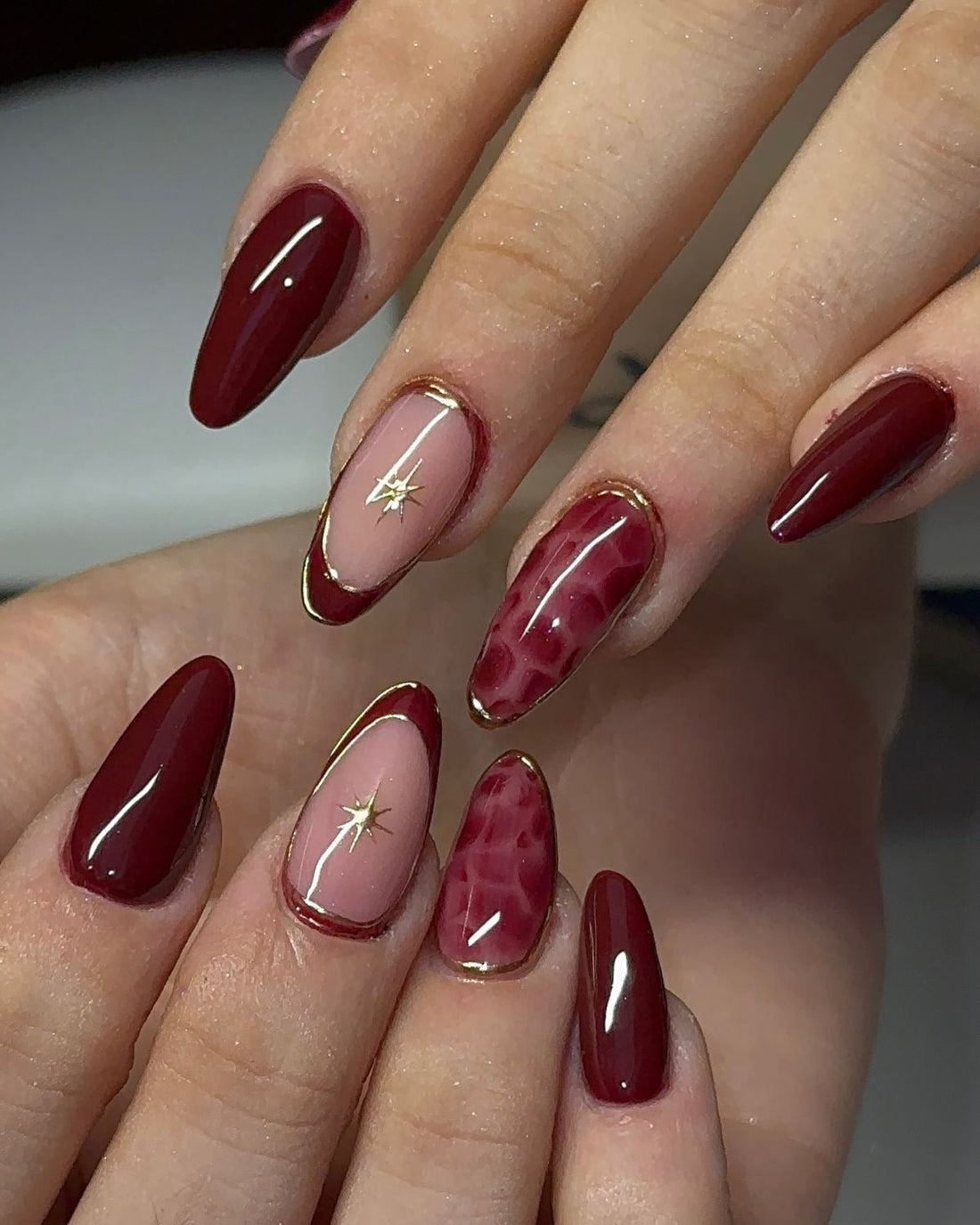 Elegant Dark Red with Gold French Tips and Star Charms — Dark Red Nails