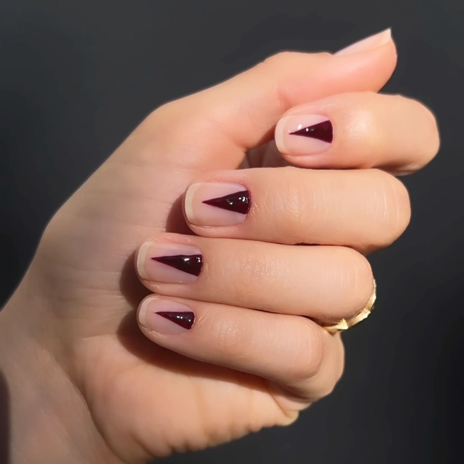 Minimalist Maroon Triangles Minimalist Maroon Triangles — Negative Space Nails