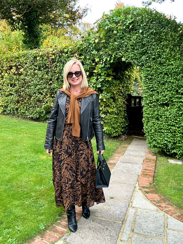 Leather Moto Jacket with Printed Dress for Casual Outing Leather Moto Jacket with Printed Dress for Casual Outing — Outfits for Women Over 50