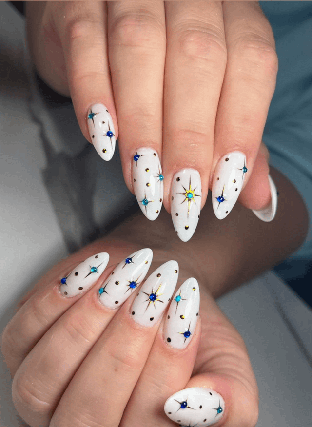 Glossy White Stiletto Starburst Nails Glossy White Stiletto Starburst Nails — Star Nails