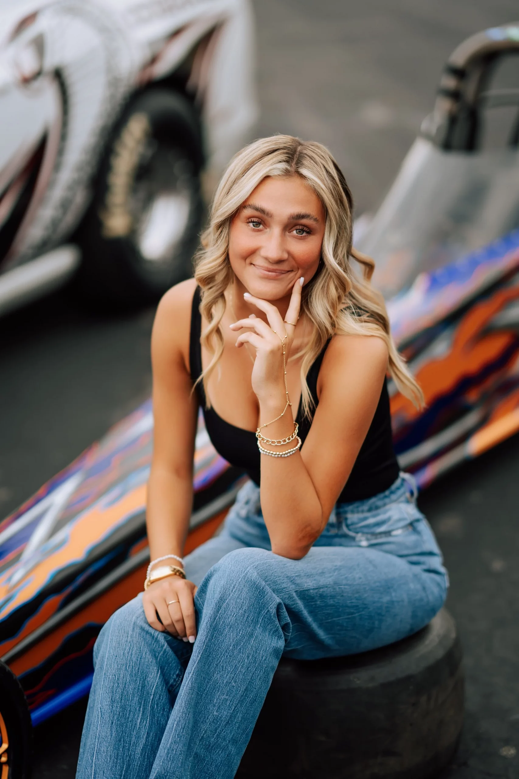 Casual Black Tank Top and Relaxed Fit Jeans with Gold Jewelry Casual Black Tank Top and Relaxed Fit Jeans with Gold Jewelry — Senior Picture Outfits