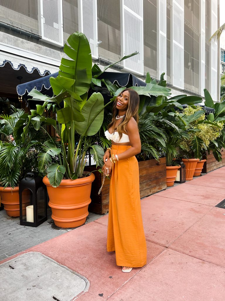 White Bandeau Top with Vibrant Orange Wide-Leg Pants White Bandeau Top with Vibrant Orange Wide-Leg Pants — Miami Outfits