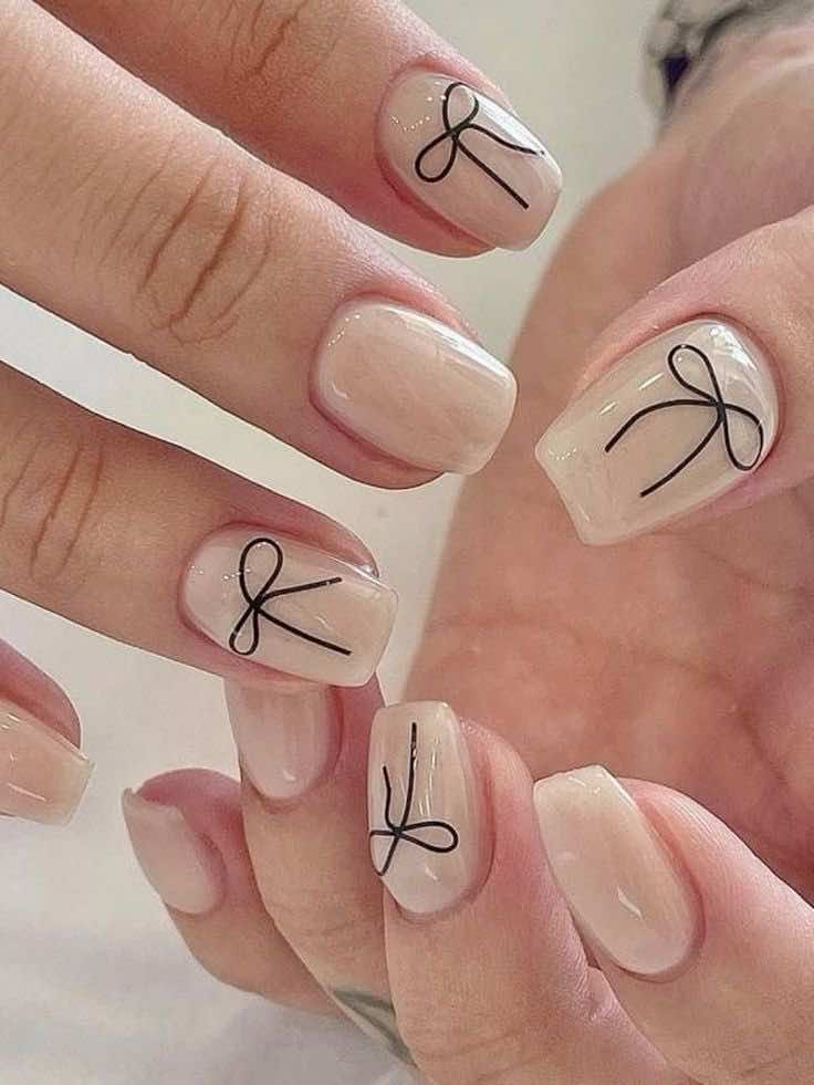 Short Nude Nails with Black Bows Short Nude Nails with Black Bows — Coquette Nails