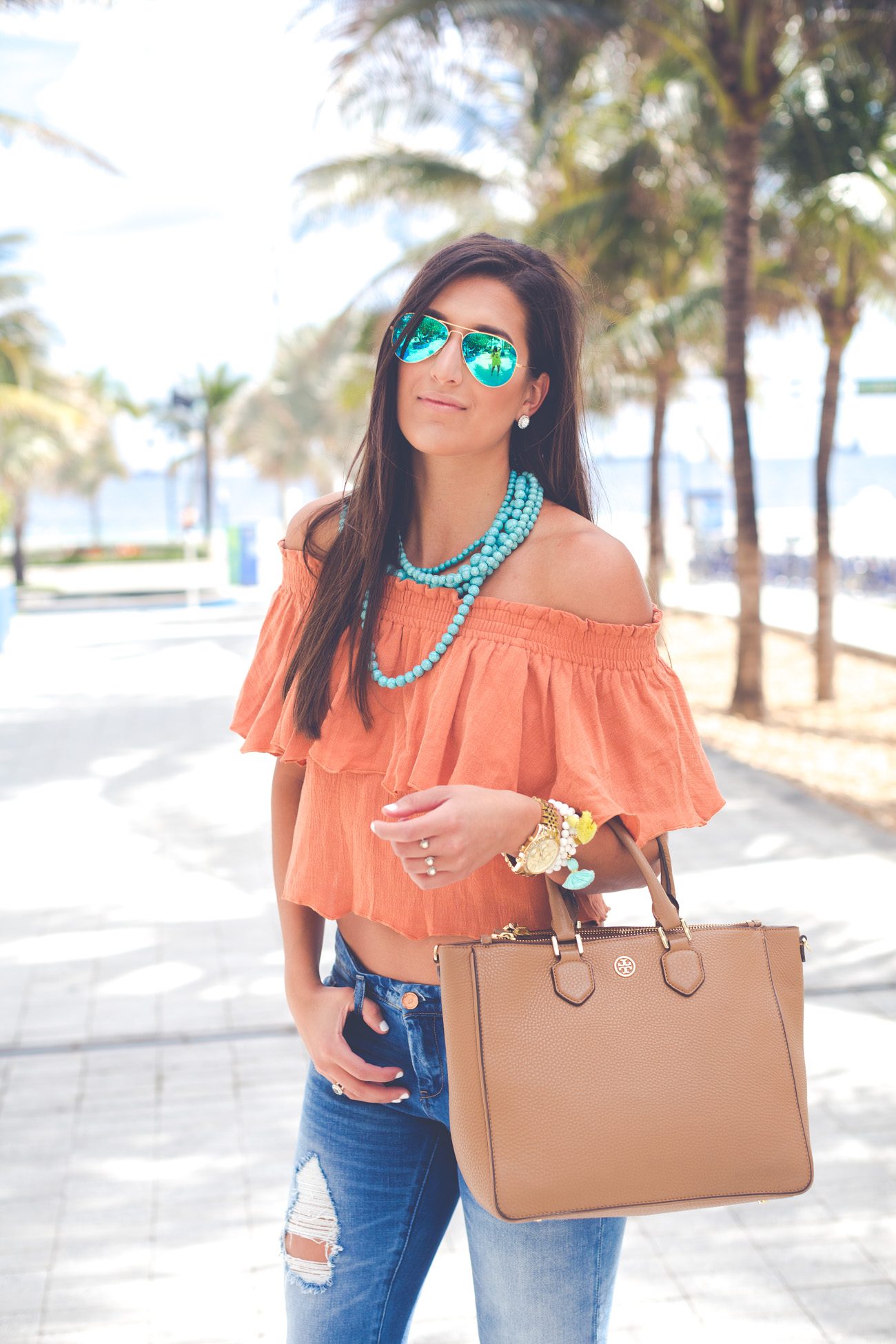 Orange Off-the-Shoulder Top with Distressed Jeans for Vacation Fun — Hawaii Outfits