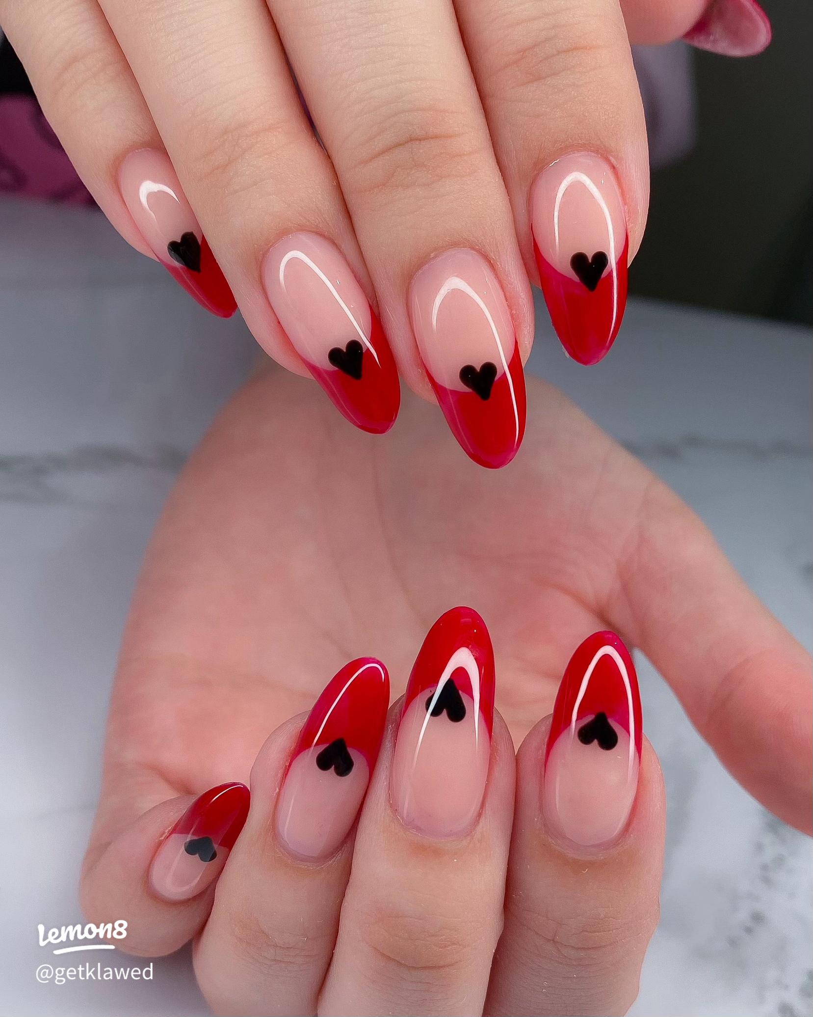 Medium Oval Red French With Black Heart Cutouts Medium Oval Red French With Black Heart Cutouts — Heart Nails